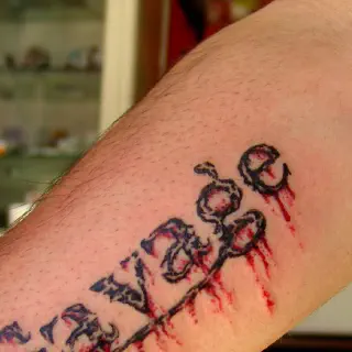 Adam Savage's Tattoo am linken Arm
