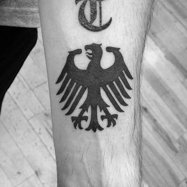 img/arm-tattoo-lion-eagle-german.jpg
