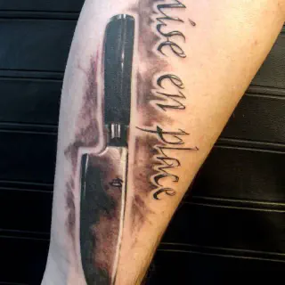 Chef Messer Arm Tattoo