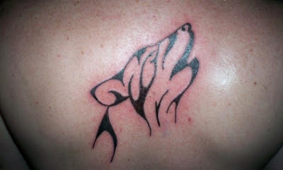 img/tribal-wolf-arm-tattoo.jpg